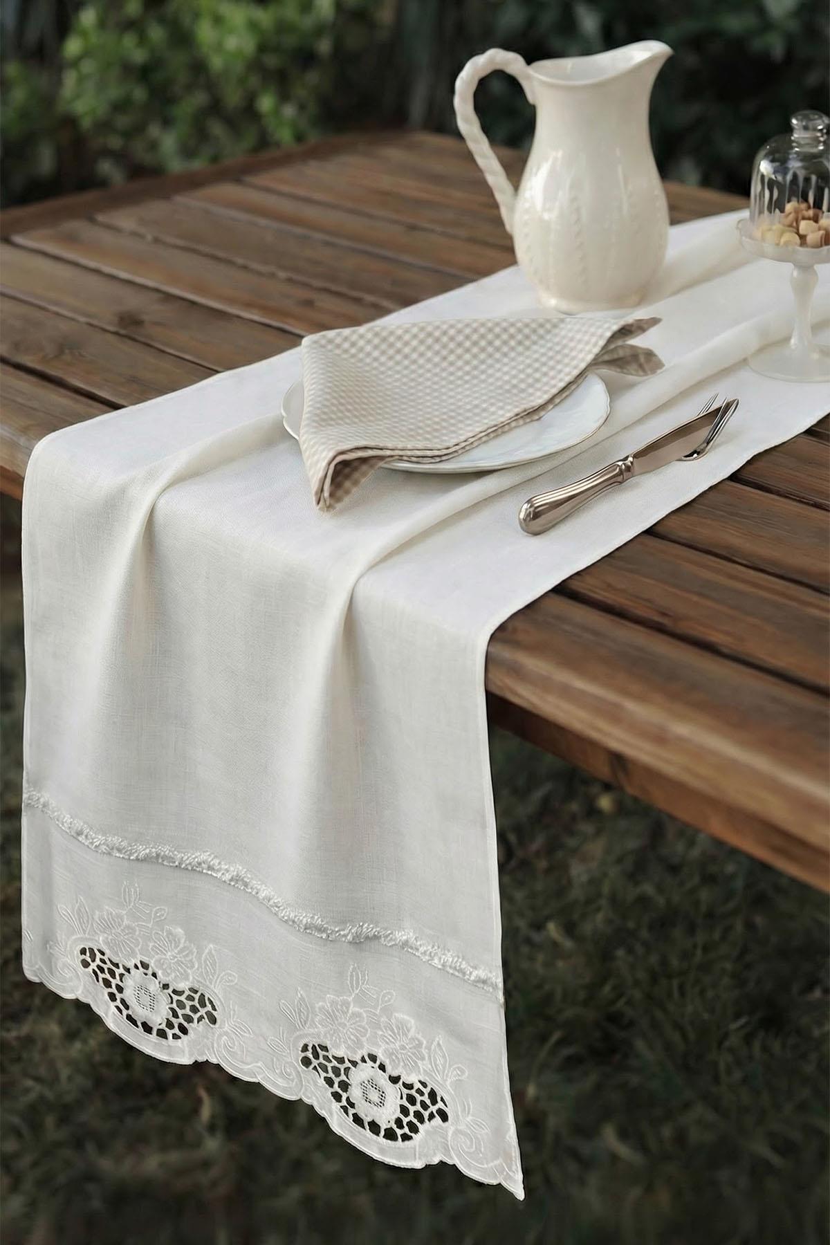 Runner de mesa antimanchas y sin costuras Puerta Leke (40 x 140 cm)
